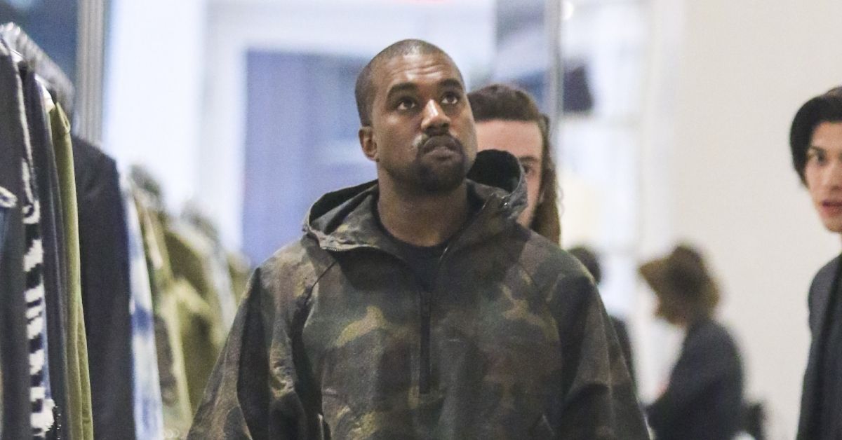 Kanye West walking through shops