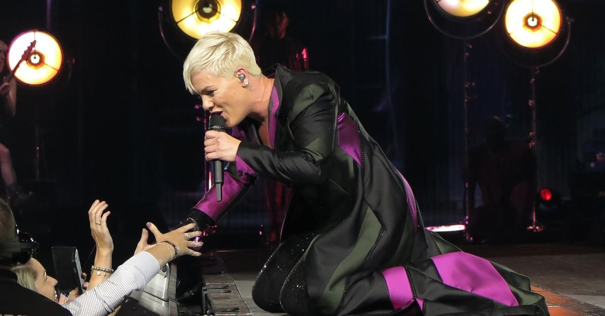 Pink sings to fans while onstage 