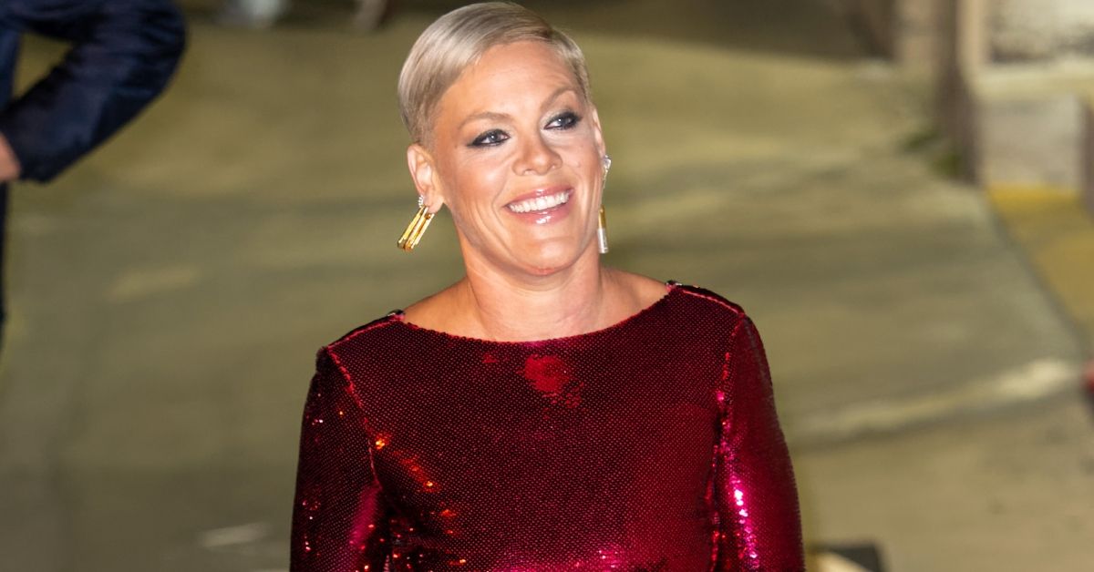 Pink walking in red dress