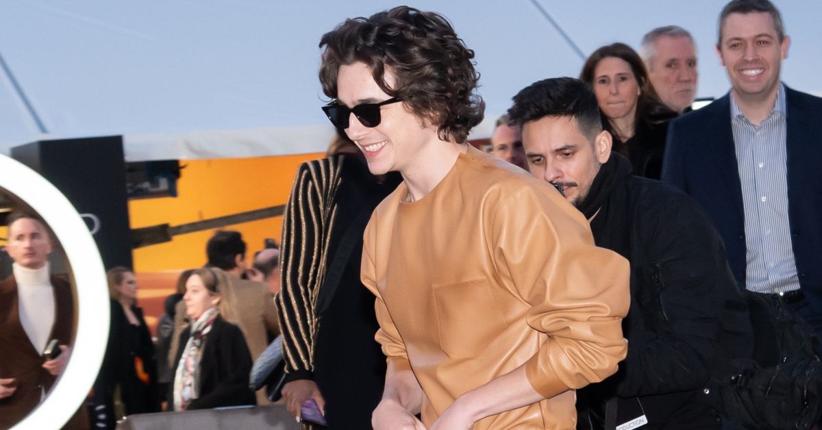 Timothée Chalamet walking from event 