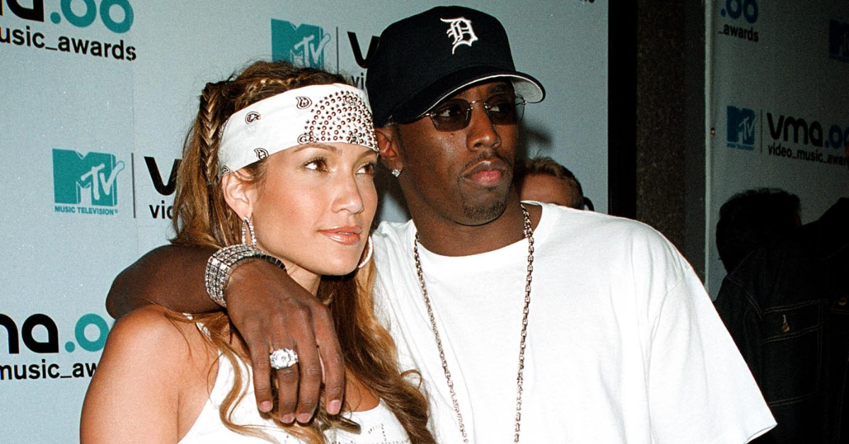 Jennifer Lopez and P. Diddy standing on a red carpet