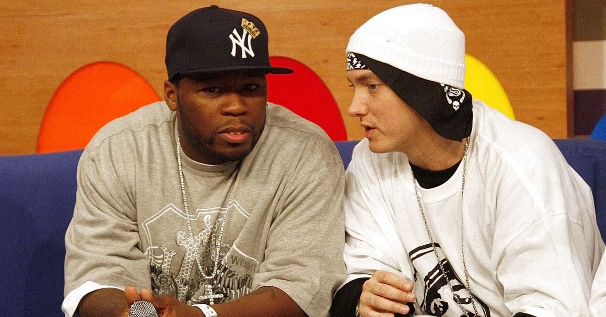 Eminem and 50 Cent sitting