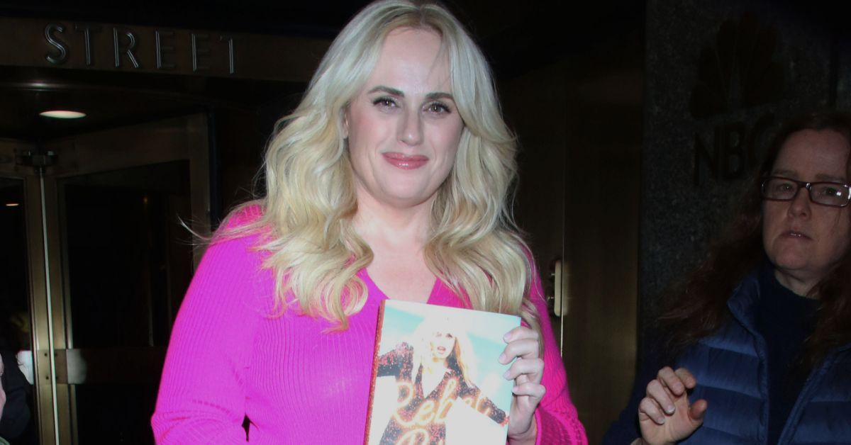 Rebel Wilson holding her book