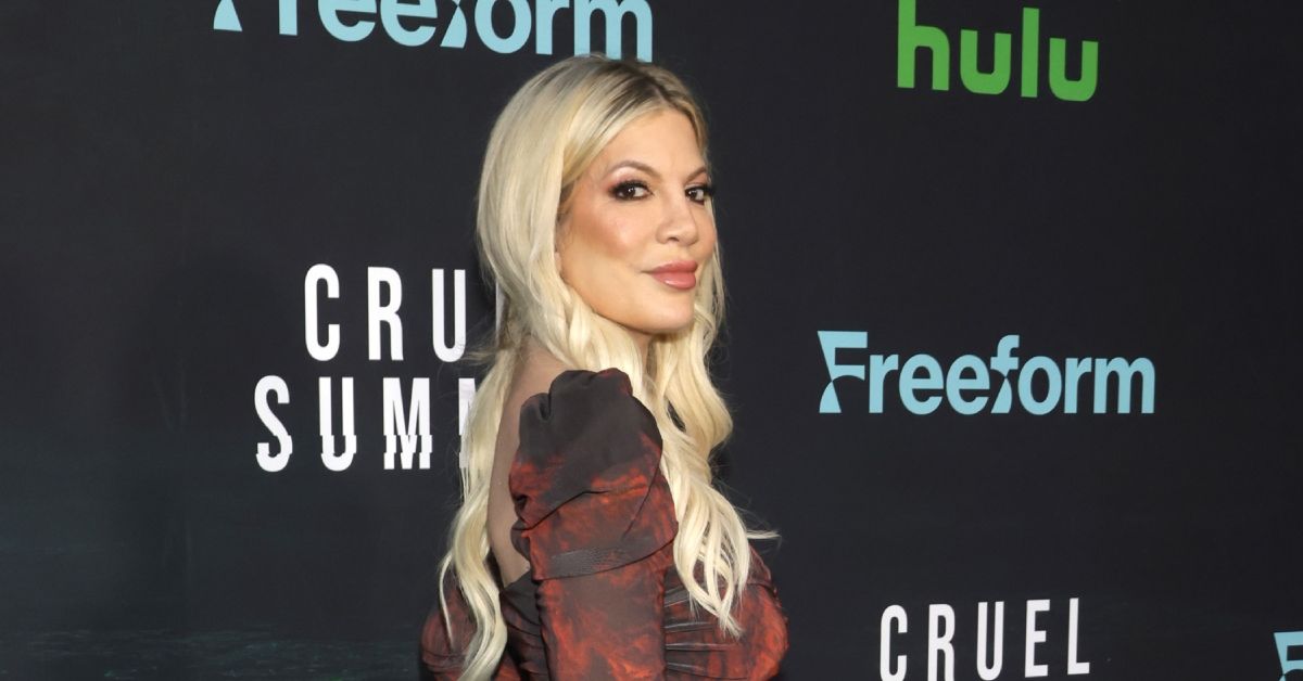 Tori Spelling poses for photos