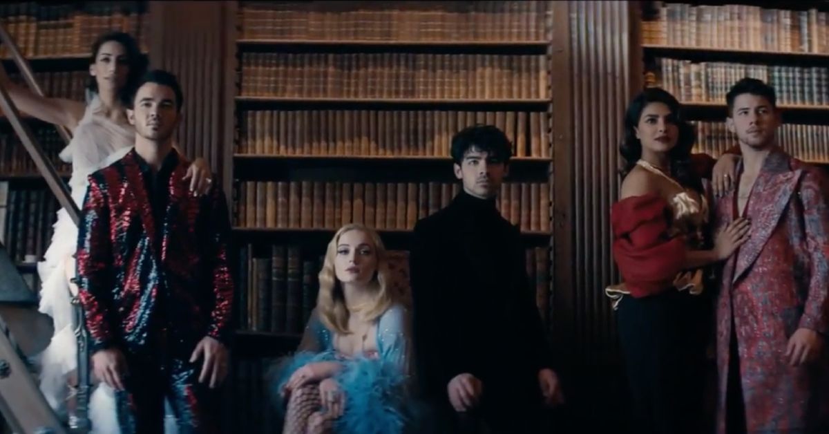 Joe Jonas, Nick Jonas, Kevin Jonas, Sophie Turner, Priyanka Chopra, and Danielle Jonas from the music video for Sucker