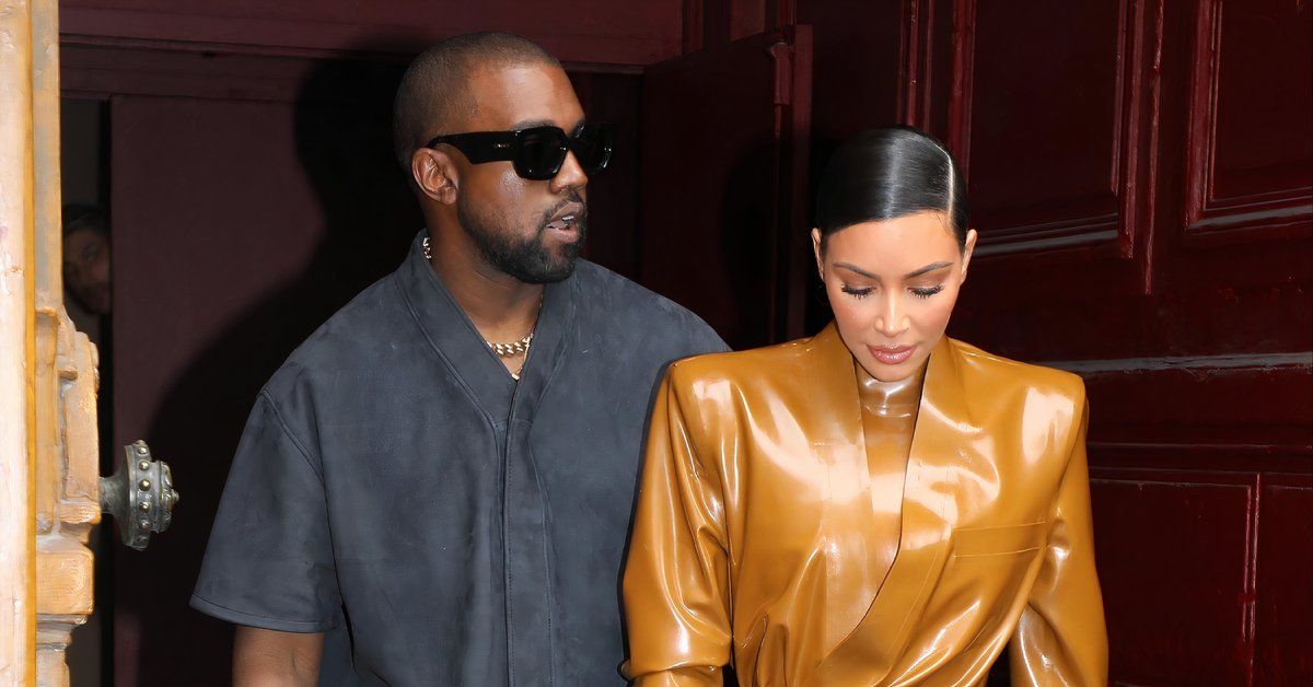 Kanye West and Kim Kardashian walking