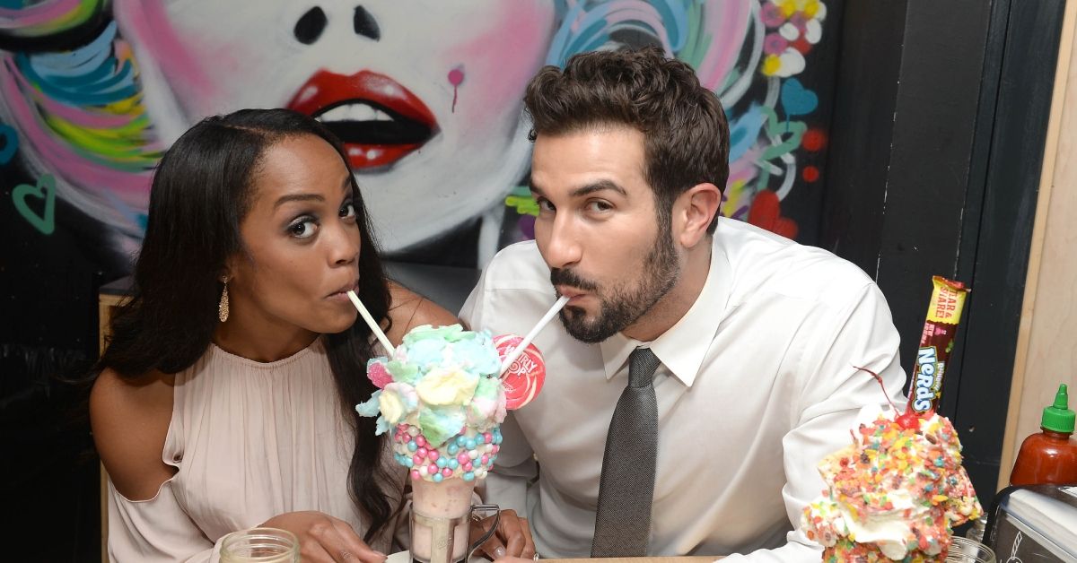 Rachel Lindsay and Bryan Abasolo drinking milkshakes