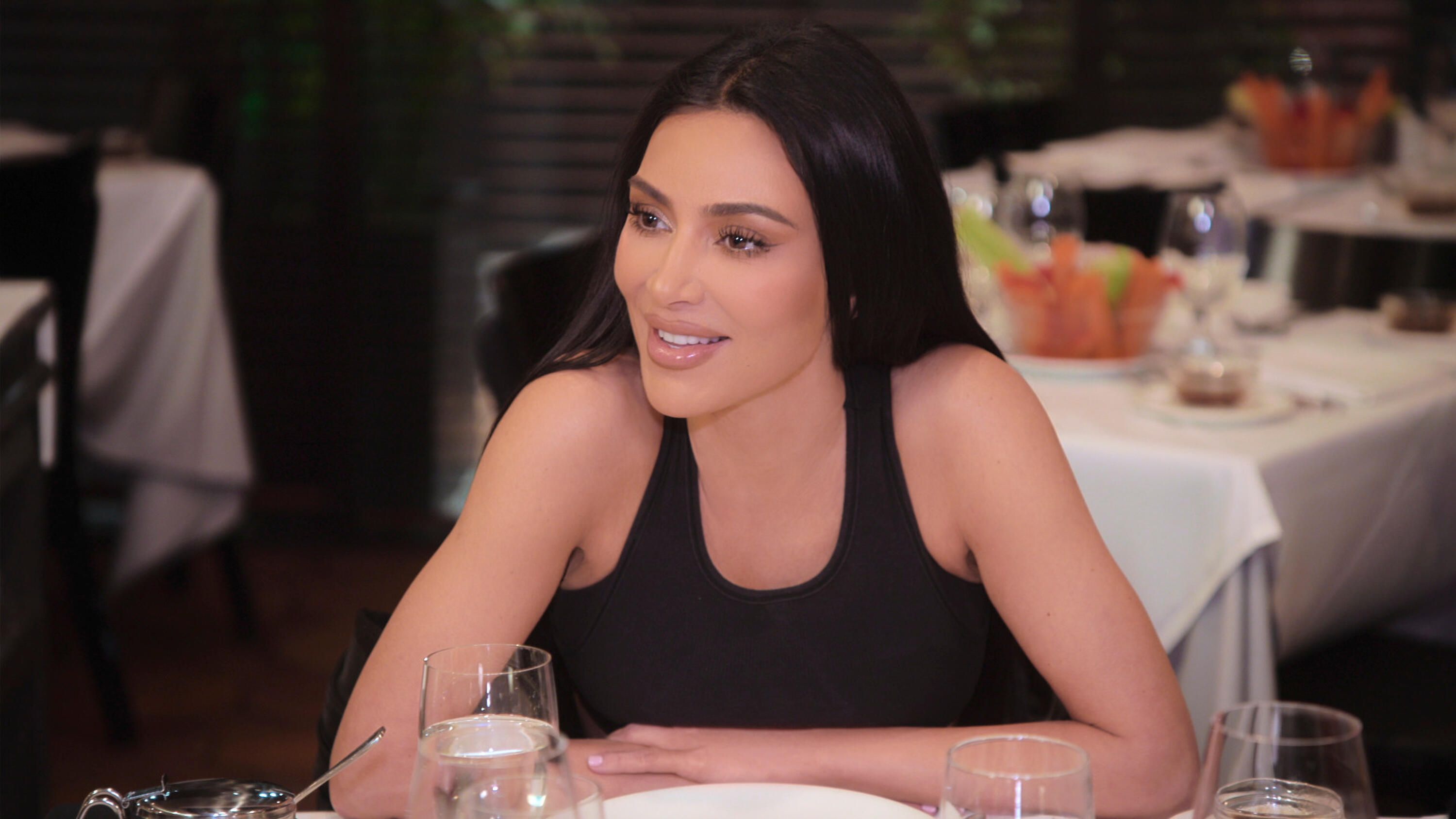 Kim Kardashian filming 'The Kardashians' in a restaurant  