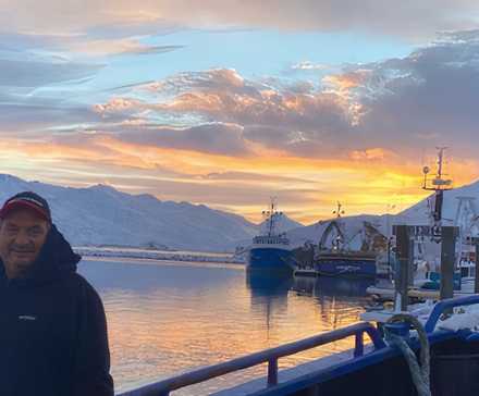 Nick Mavar poses infront of a ship