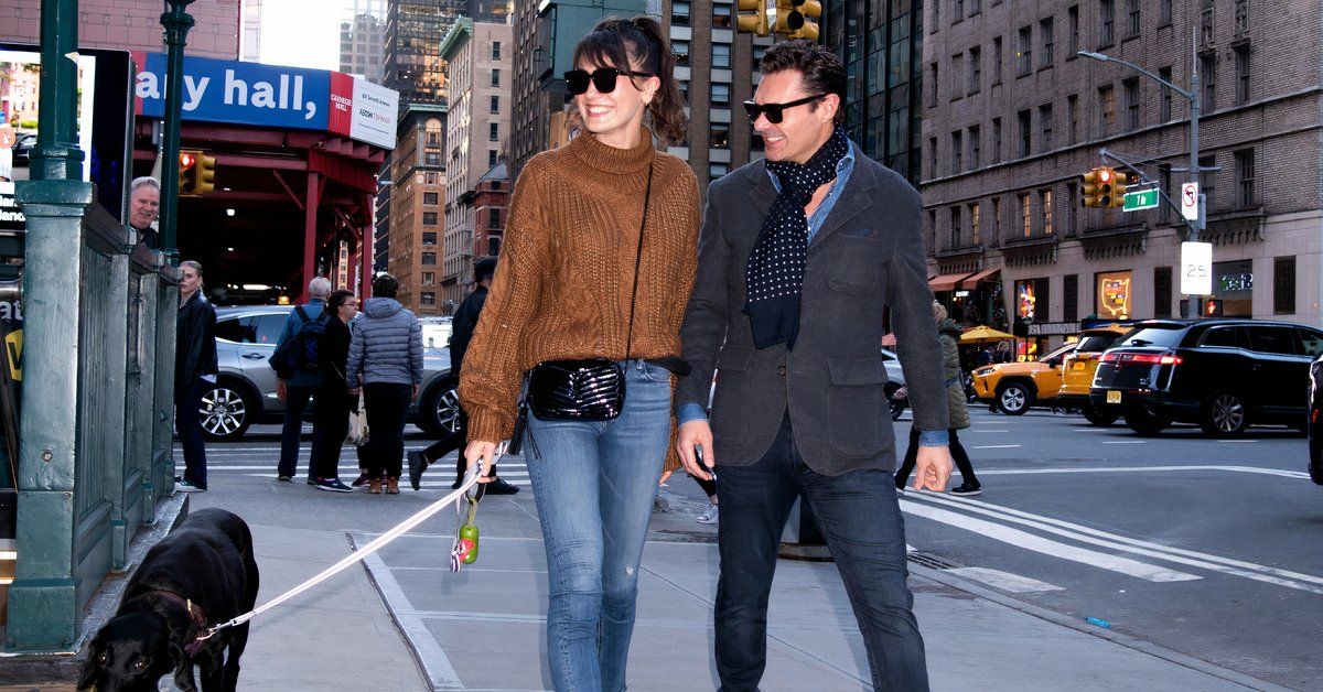 Ryan Seacrest And Aubrey Paige walking their dog