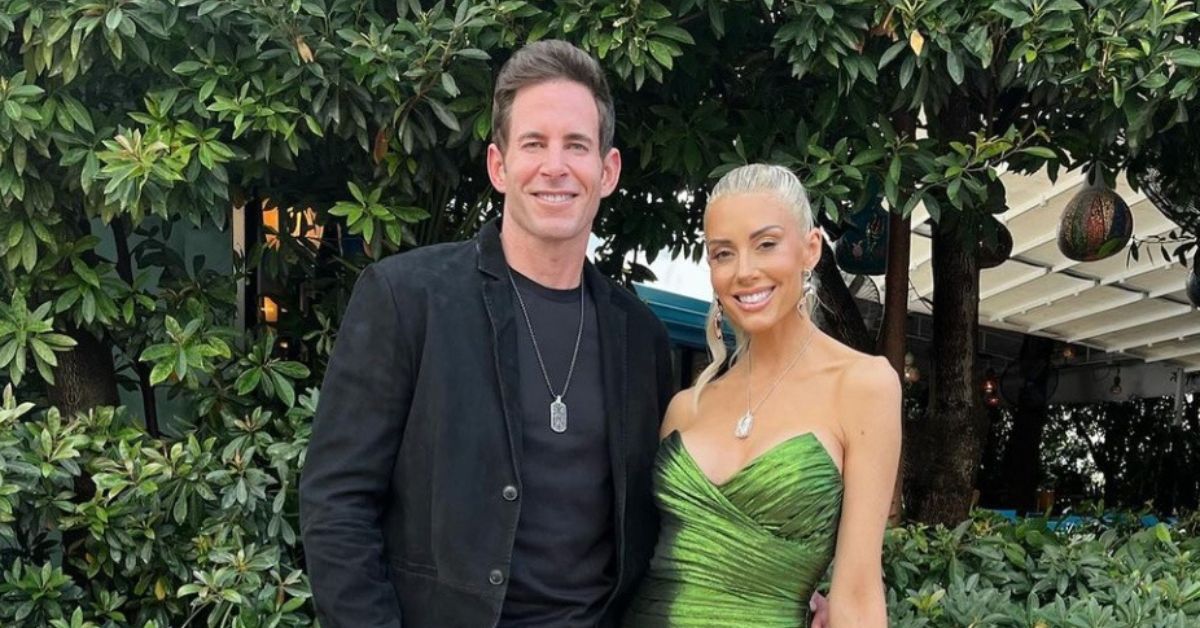 Tarek El Moussa and Heather Rae Young posing for a picture