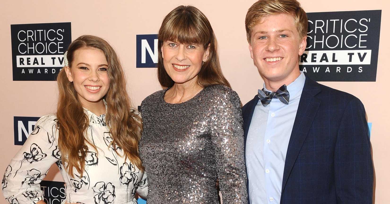 Bindi Irwin poses with her mother and brother