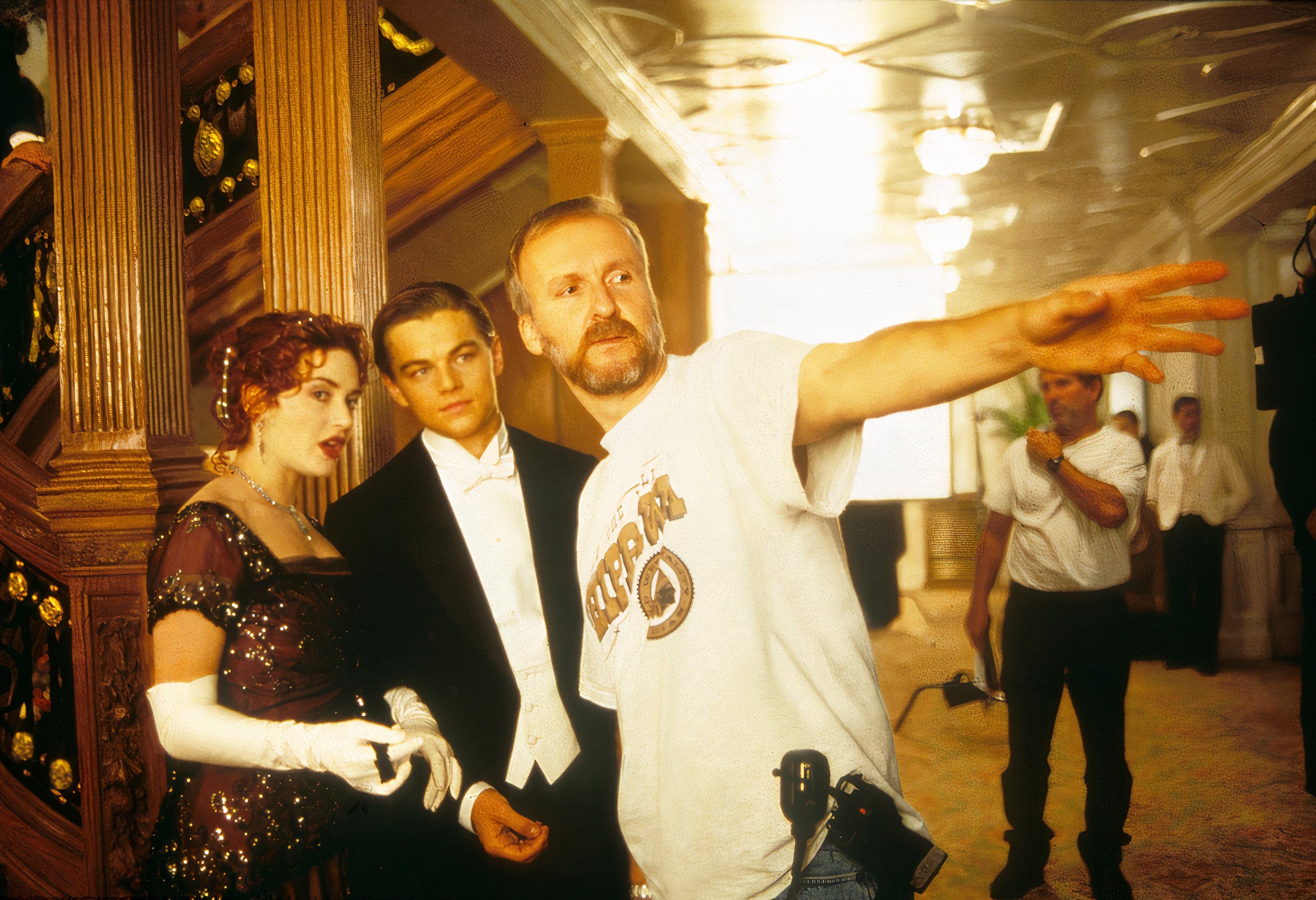 Leonardo DiCaprio, Kate Winslet, and James Cameron on Titanic set