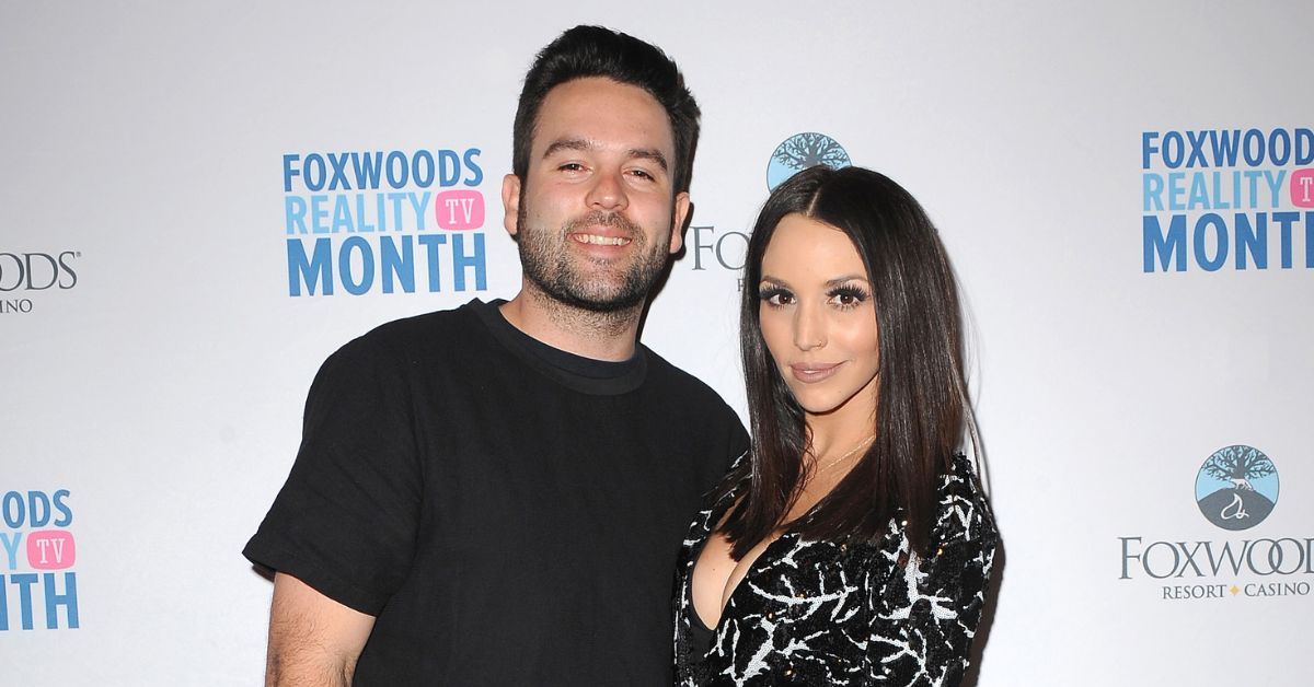 Mike Shay and Scheana Shay smiling
