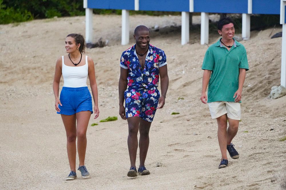 Deal or No Deal Island's Maria-Grace Cook MG, Dickson Wong, and Phillip Solomon walking on the beach