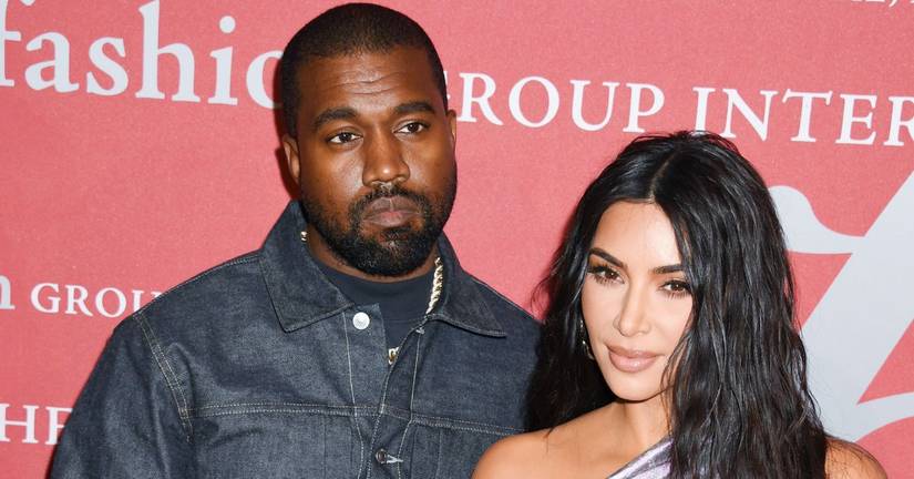 Kim Kardashian and Ye posing