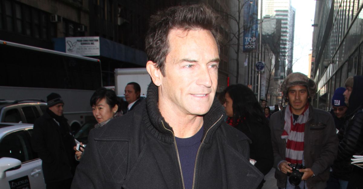 Survivor's Jeff Probst surrounded by people