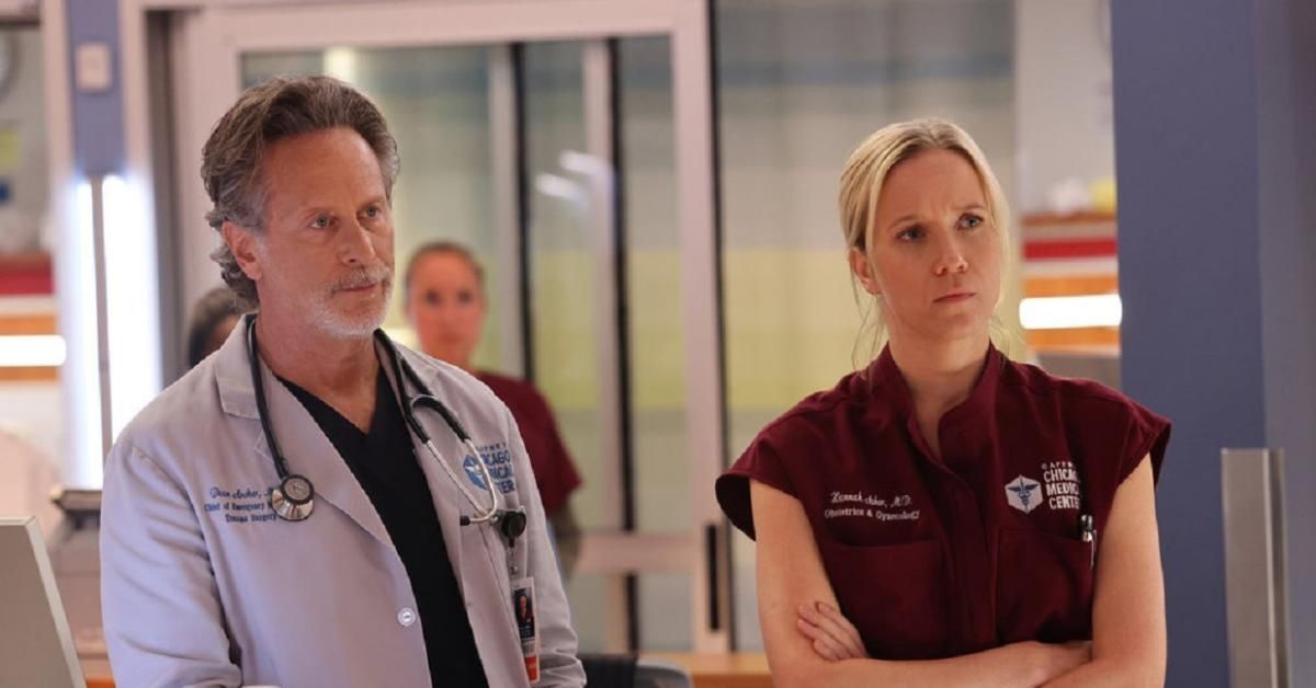 Chicago Med's Steven Weber and Jessy Schram looking worried