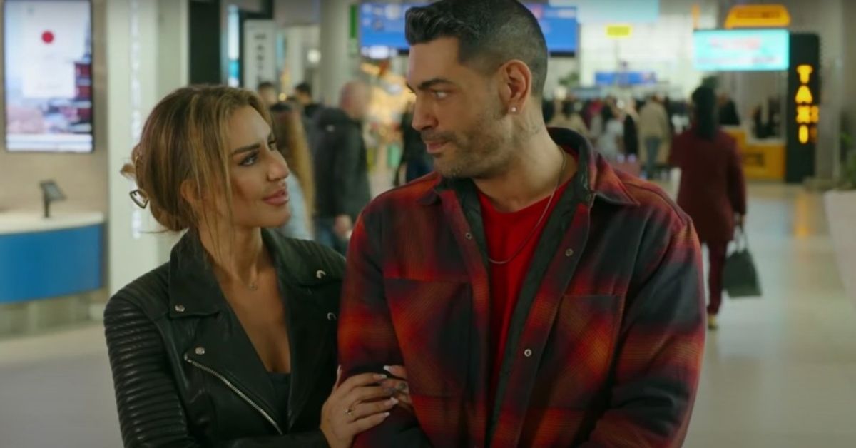 90 Day Fiance's Shekinah Garner and Sarper Guven looking at each other