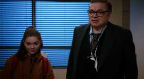 Chicago Med's Hannah Riley and Oliver Platt standing together