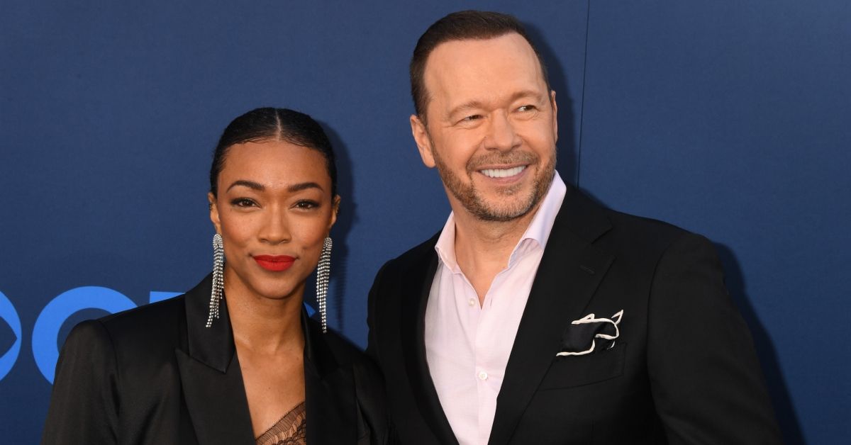 Sonequa Martin-Green and Donnie Wahlberg looking happy