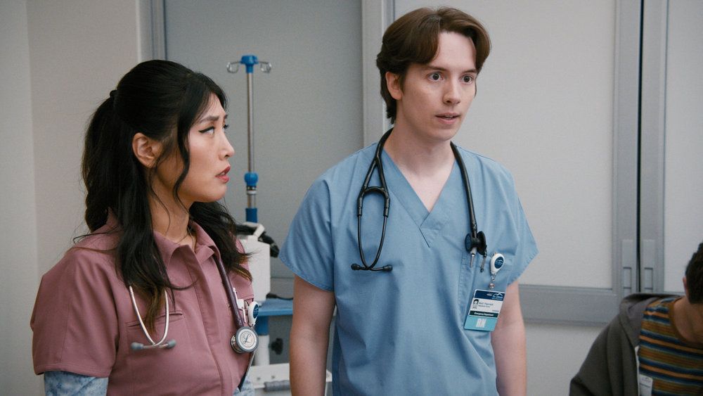 St. Denis Medical's Mekki Leeper as Matt and Kahyun Kim as Serena in a hospital room