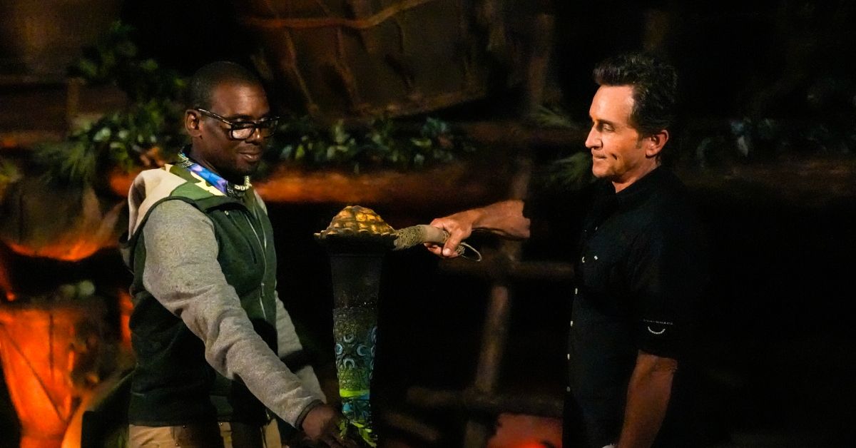 Survivor's Cedrek McFadden having his torch snuffed by Jeff Probst