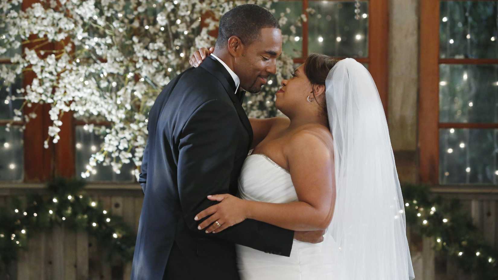 Grey's Anatomy's Ben Warren (Jason George) and Miranda Bailey (Chandra Wilson) embrace at their wedding